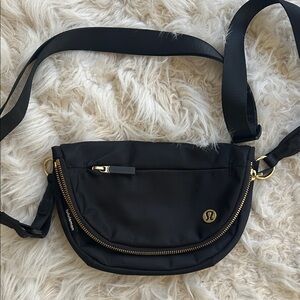 NWOT lululemon athletica Black and Gold Crossbody Bag